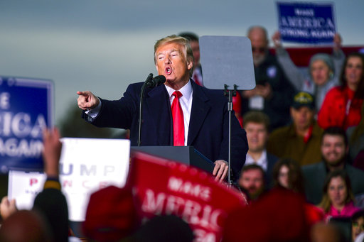 President Donald Trump speaks at a rally on Nov. 2, 2018, at the Tri-State Airport in Huntington, W.Va. (AP/Tyler Evert)