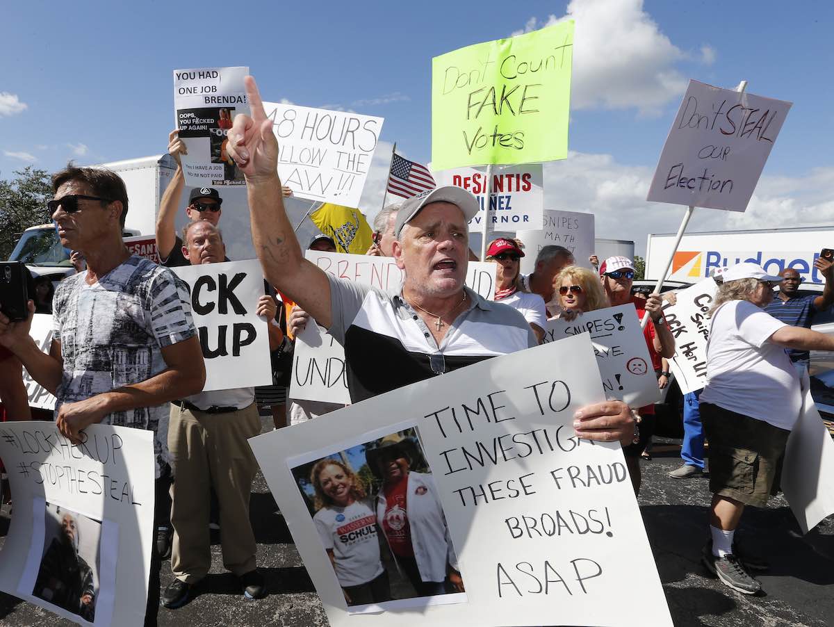A crowd protests outside the Broward County Supervisor of Elections office in Lauderhill, Fla., on Nov. 9, 2018. (AP)