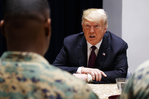 President Donald Trump visits with Marines at Marine Barracks Washington, Thursday, Nov. 15, 2018, in Washington. (AP Photo/Evan Vucci)