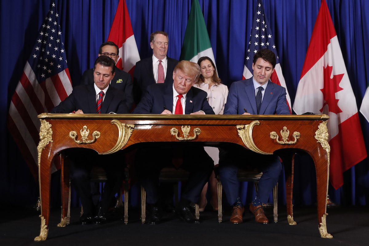 President Donald Trump, Canada's Prime Minister Justin Trudeau and Mexico's President Enrique Pena Nieto, participate in the USMCA signing ceremony at G20 in Buenos Aires, Argentina on Nov. 30, 2018.
