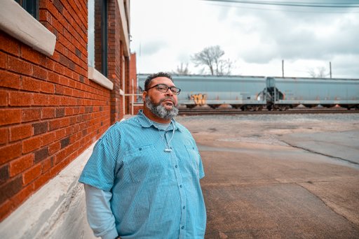 Thommy Hill stands outside the Cabell County/Huntington Health Department, where he works in the harm reduction program, on Dec. 5, 2018. (AP)
