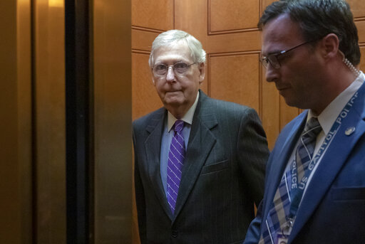 Senate Majority Leader Mitch McConnell, R-Ky., takes an elevator after leaving the chamber, at the Capitol in Washington, Wednesday, Jan. 23, 2019. (AP Photo/J. Scott Applewhite)