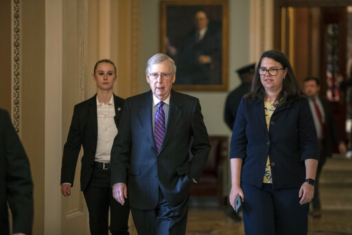 Senate Majority Leader Mitch McConnell, R-Ky., and Secretary for the Majority Laura Dove, right, in the U.S. Capitol on Jan. 23, 2019. (AP)