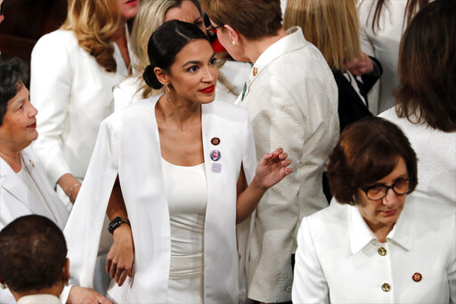 Rep. Alexandria Ocasio-Cortez, D-N.Y., center, arrives before President Donald Trump delivers his State of the Union address on Feb. 5, 2019. (AP)