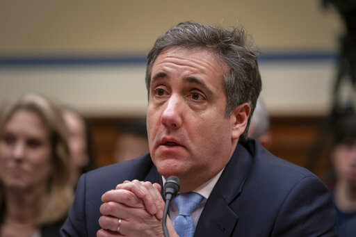 Michael Cohen, President Donald Trump's former personal lawyer, becomes emotional as he finishes a day of testimony to the House Oversight and Reform Committee, on Capitol Hill, Feb. 27, 2019. (AP Photo)