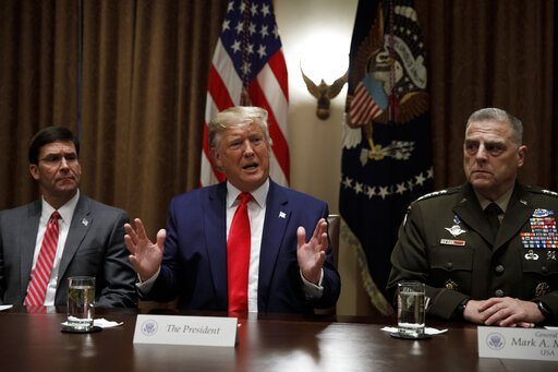 President Donald Trump, joined by Defense Secretary Mark Esper and Chairman of the Joint Chiefs of Staff Gen. Mark Milley, speaks during a briefing with senior military leaders at the White House on Oct. 7, 2019. (AP/Kaster)