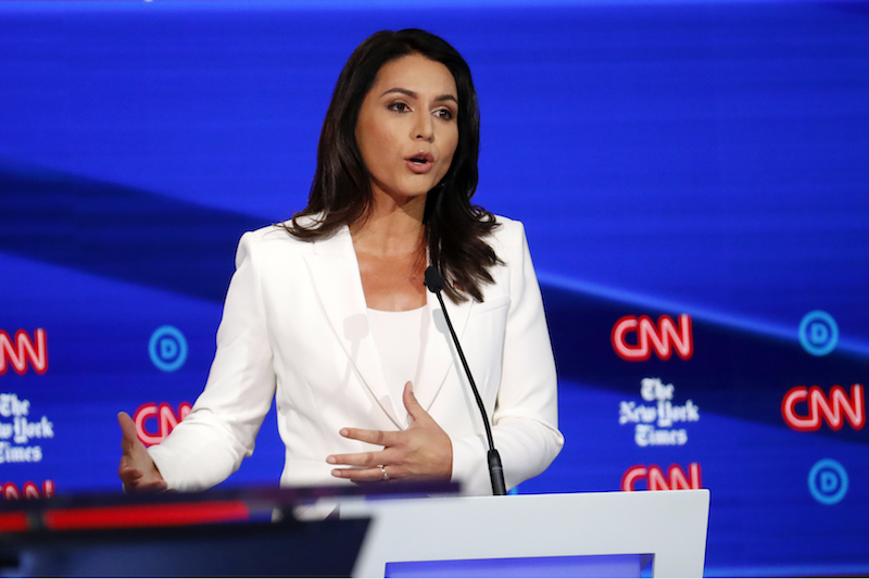 U.S. Rep. Tulsi Gabbard, D-Hawaii, participates in a Democratic presidential primary debate hosted by CNN/New York Times at Otterbein University, Oct. 15, 2019, in Westerville, Ohio.