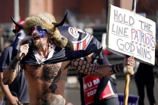 Politifact Face Painted Man In Horned Fur Cap At Capitol Riot Supports Trump And Qanon Not Antifa