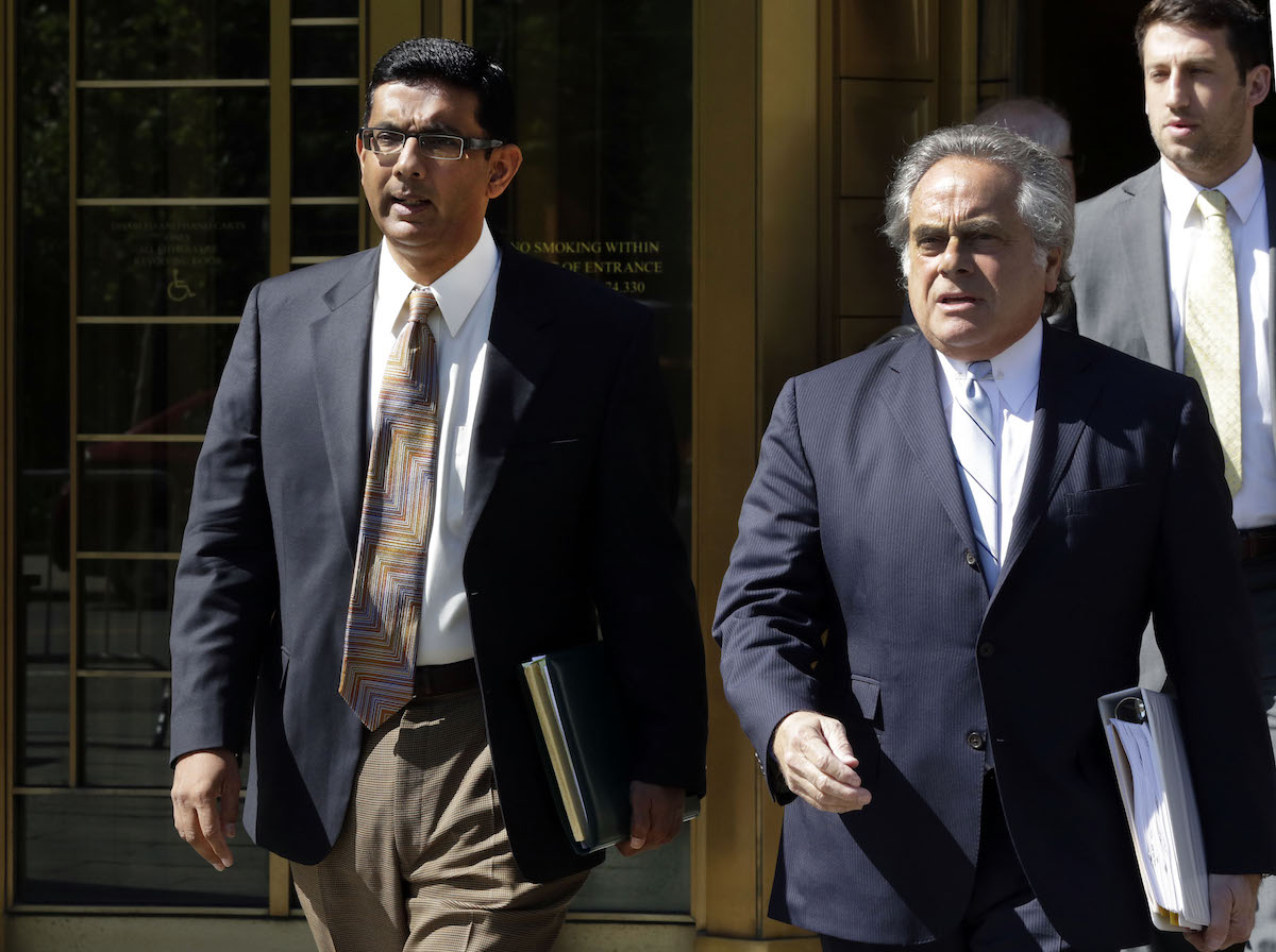 President Donald Trump announced he would pardon Dinesh D'Souza, who pleaded guilty to making illegal campaign contributions in 2014 on May 31, 2018.