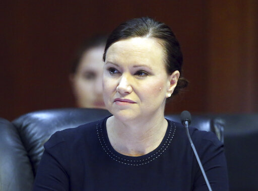 Florida Attorney General Ashley Moody listen to the proceedings during a meeting of the Florida Cabinet Tuesday June 4, 2019, in Tallahassee, Fla. (AP)