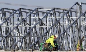 President Barack Obama cheered a positive December jobs report, but his administration also had to fend off attacks that they had promised that unemployment wouldn't rise higher than 8 percent.