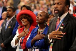 Delegates recite the Pledge of Allegiance during day two of the DNC in Charlotte on Wednesday. President Barack Obama's nomination acceptance speech has been moved indoors tonight because of the possibility of severe weather.