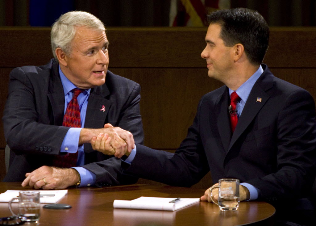 Democrat Tom Barrett and Republican Scott Walker at a recent debate