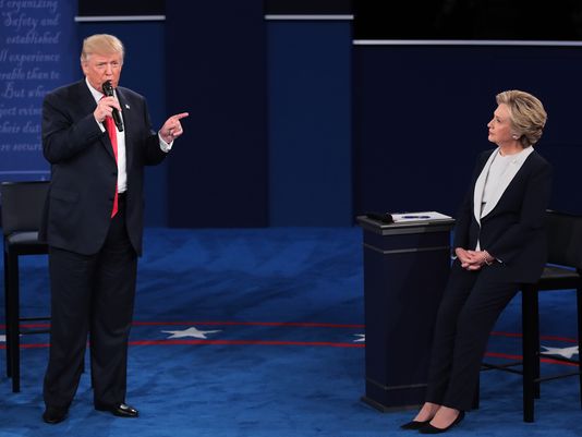 Donald Trump and Hillary Clinton, shown here at a presidential debate in St. Louis on Oct. 9, 2016, were a dominant presence in PolitiFact Wisconsin's most-clicked items in 2016. (Getty Images)