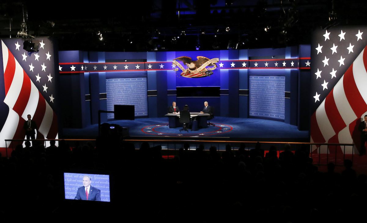 Republican vice-presidential nominee Gov. Mike Pence, right and Democratic vice-presidential nominee Sen. Tim Kaine debate during the vice-presidential debate at Longwood University in Farmville, Va., Tuesday, Oct. 4, 2016. (AP Photo/Steve Helber)