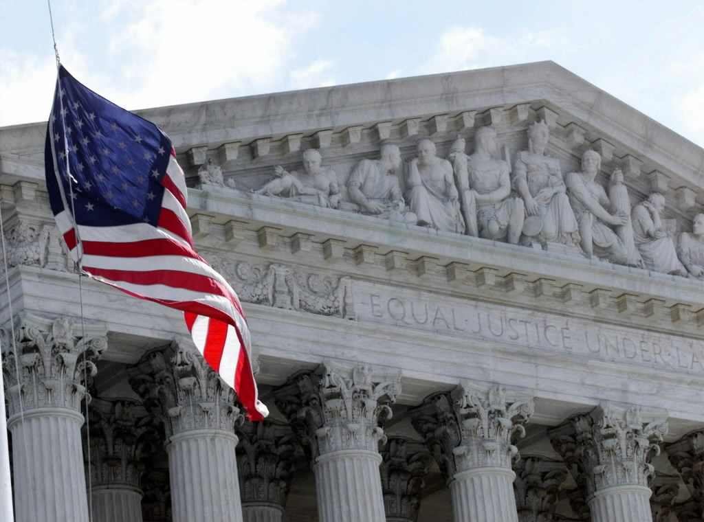 A flag is flown at half staff. (Journal Sentinel files)
