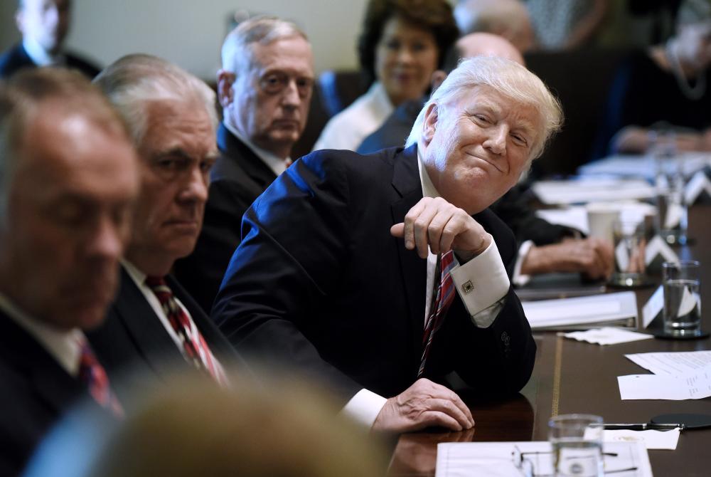 Preisdent Donald Trump attends a meeting in the Cabinet Room of the White House June 12, 2017, in Washington. (Getty)