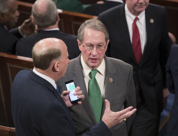 Rep. Bob Goodlatte, R-Va., talks with a colleague in the House Chamber on Jan. 3, 2017. The previous night, House Republicans approved Goodlatte's amendment to weaken the independent Office of Congressional Ethics. (AP/J. Scott Applewhite)