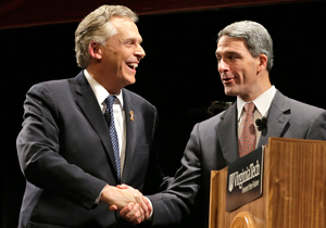 Democrat Terry McAuliffe, left, and Republican Ken Cuccinelli shake hands before their final debate in the Nov. 5 gubernatorial election. Photo by AP.
