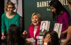 Former Secretary of State Hillary Clinton signs her new book, "Hard Choices," June 10, 2014, in New York City.