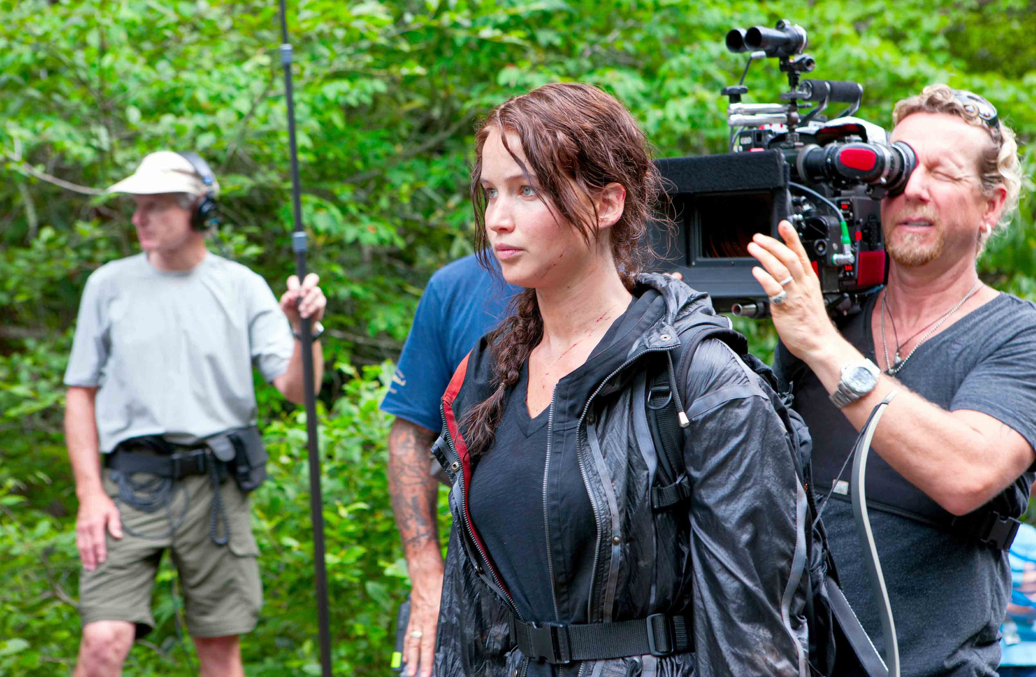 "The Hunger Games" star Jennifer Lawrence with a film crew in North Carolina in 2011, during filming. Photo credit: Murray Close, Lionsgate Films