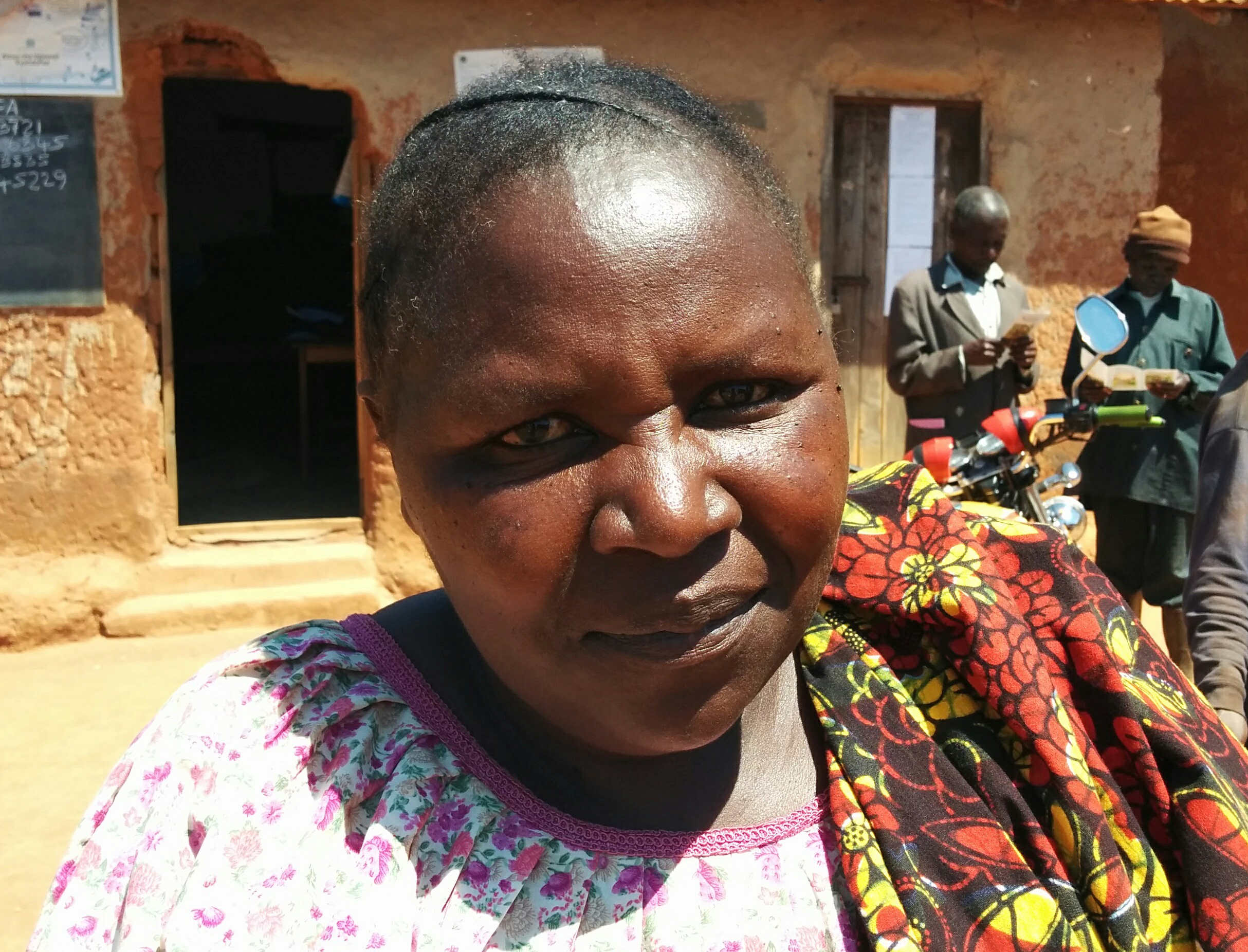 Rhoda Kagine, a farmer Mawambala, Tanzania, is ready to spend more to grow more, but worries that drought might ruin the harvest. (Jon Greenberg)