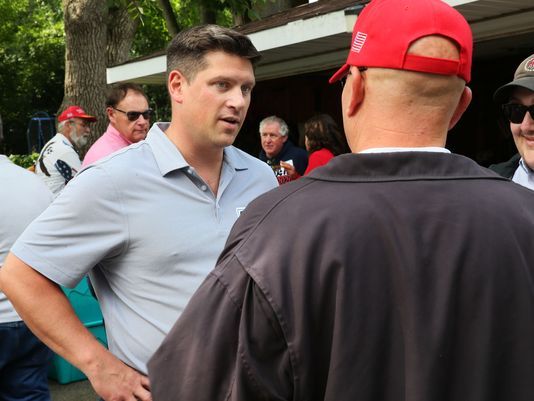 Republican Kevin Nicholson, shown here at political picnic, has emphasized his military experience but questioned veterans who are Democrats. (Michael Sears/Milwaukee Journal Sentinel)