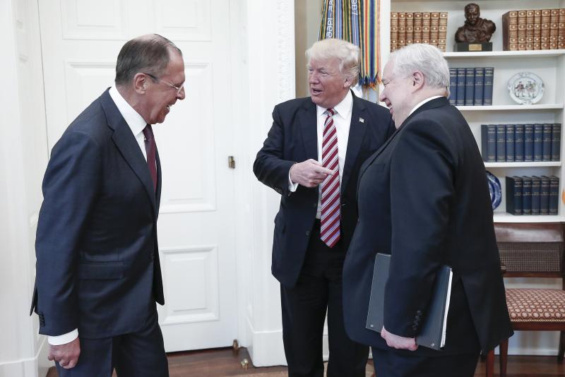 From left, Russia's Foreign Minister Sergei Lavrov, U.S. President Donald Trump, and Russian Ambassador to the United States Sergei Kislyak talk during a meeting in the Oval Office at the White House on Wednesday, May 10, 2017, in Washington, D.C. (TASS)
