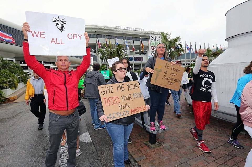 Protesters have their say against President Trump's executive orders on immigration during a rally at Miami International Airport on Sunday, January 29, 2017. (Miami Herald)