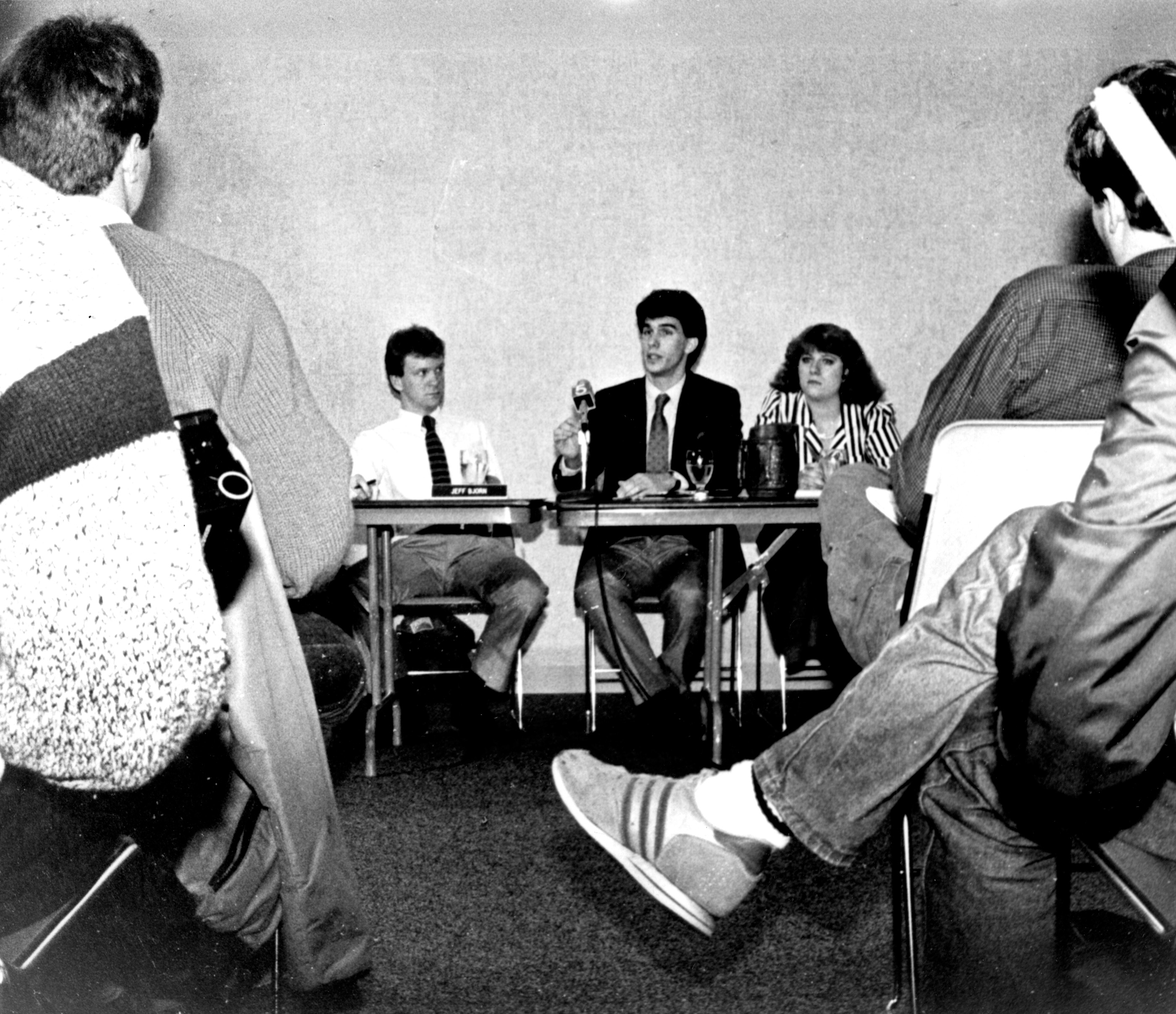 The 1987 Marquette yearbook shows student government officials Jeff Bjorn, Scott Walker and Kiki White announcing results of an impeachment probe of student leaders. Source: Dept. of Special Collections and University Archives, Marquette U. Libraries