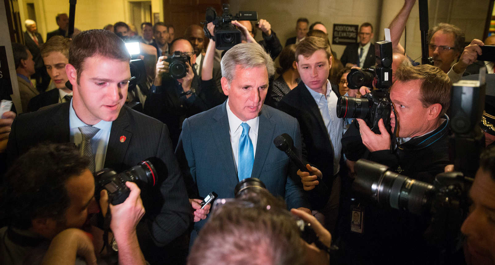 House Majority Leader Kevin McCarthy (R-Calif.) , surrounded by reporters, unexpectedly dropped his bid to be House Speaker. (NYT)
