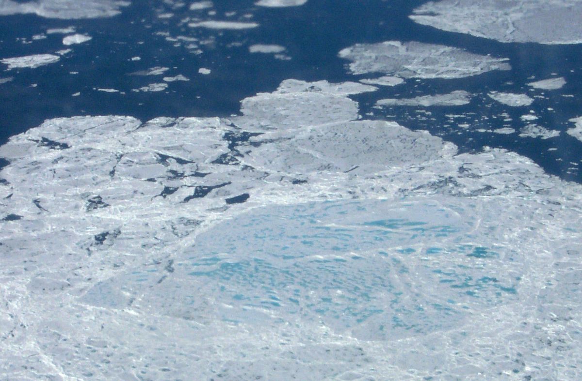 Melt ponds on sea ice in Baffin Bay, taken from a Navy research aircraft. (NASA)