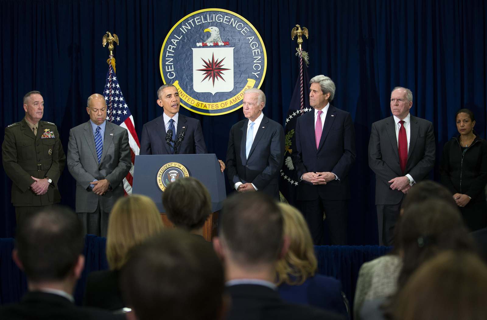President Barack Obama, with a group of national security officials, speaks following a meeting at CIA headquarters in Langley, Va., April 13. (New York Times)