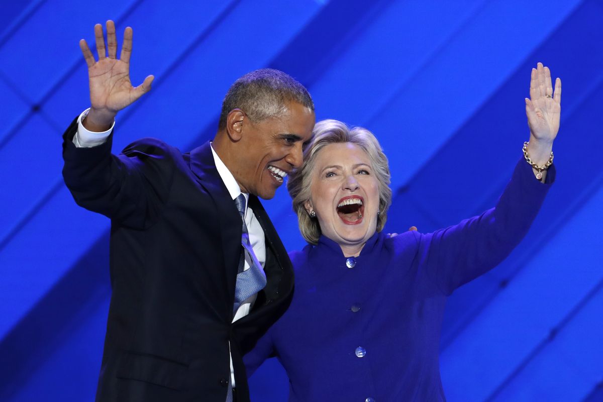 President Barack Obama and Democratic presidential candidate Hillary Clinton wave to the crowd during the third day of the Democratic National Convention in Philadelphia. (AP)