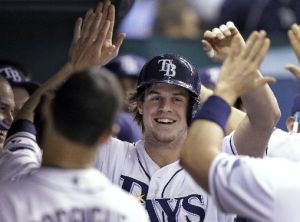 The Tampa Bay Rays' Wil Myers, the American League Rookie of the Year, high-fives his teammates in September.