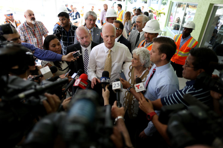Gov. Rick Scott denied reports that state banned the term "climate change"