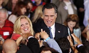Ann and Mitt Romney greet supporters in Tampa on Tuesday after a Florida primary win.