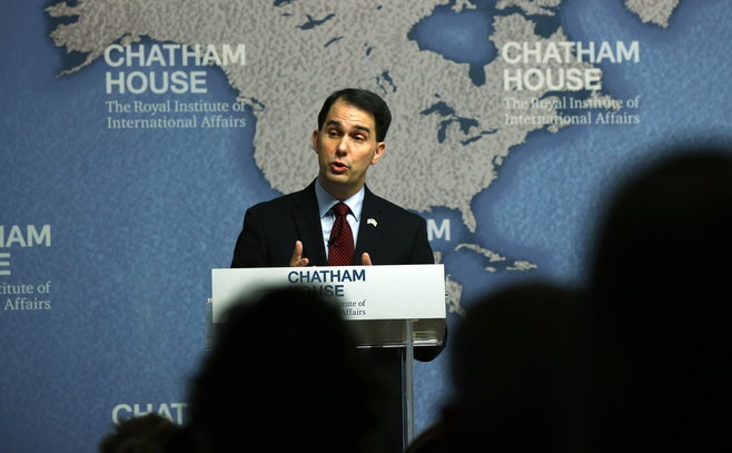 Gov. Scott Walker, shown here speaking at Chatham House in London on Feb. 11, 2015, was a central figure in out most-clicked items that month. (AP photo)