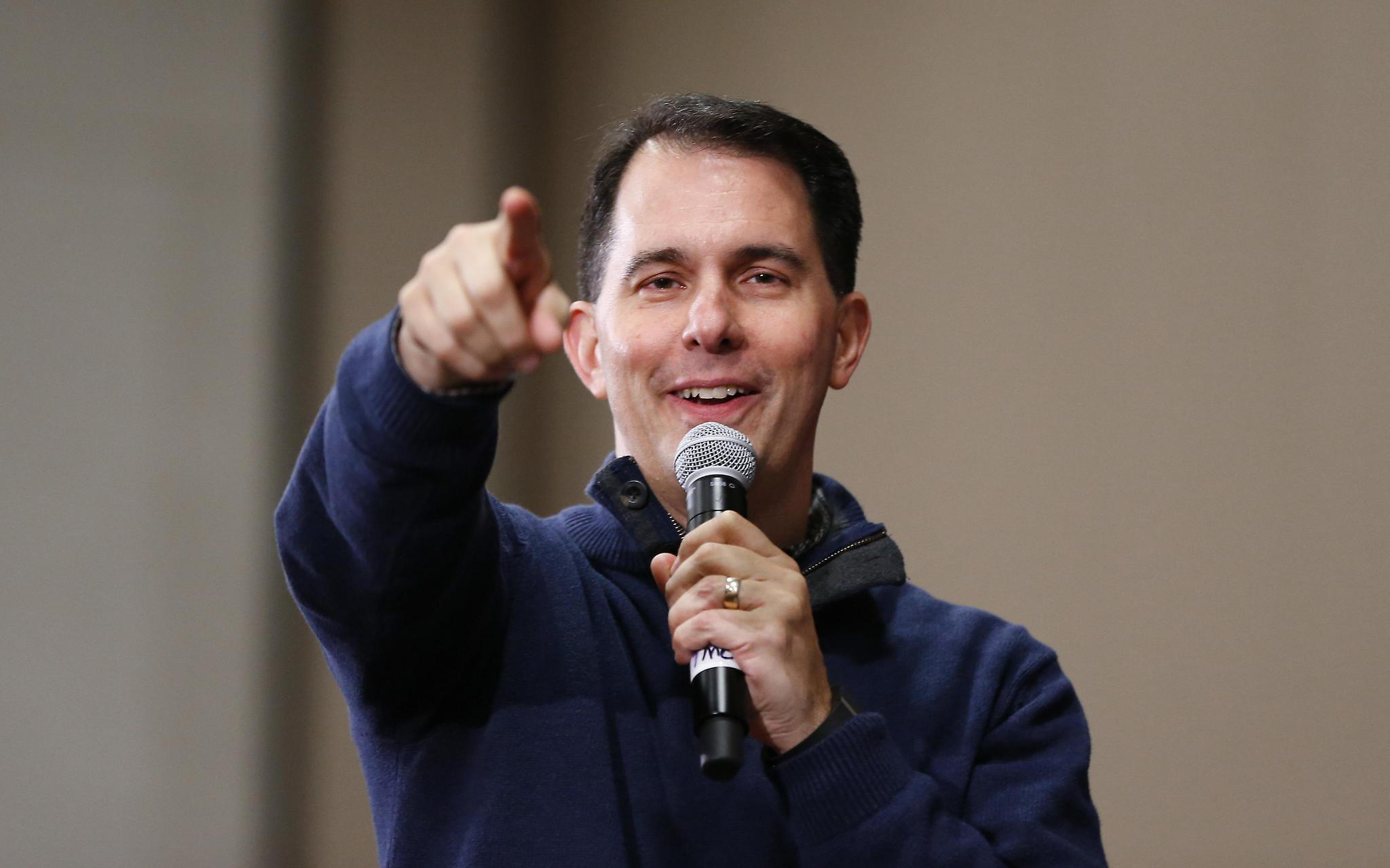Among the campaign promises made by Gov. Scott Walker were two pledges not to do things. (Milwaukee Journal Sentinel)