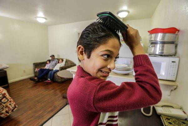 Eleven-year-old Omran Wawieh, a refugee from Syria, is staying with parents and siblings at a motel in Pomona, Calif., on Nov. 17, 2015. (Irfan Khan/Los Angeles Times/TNS)