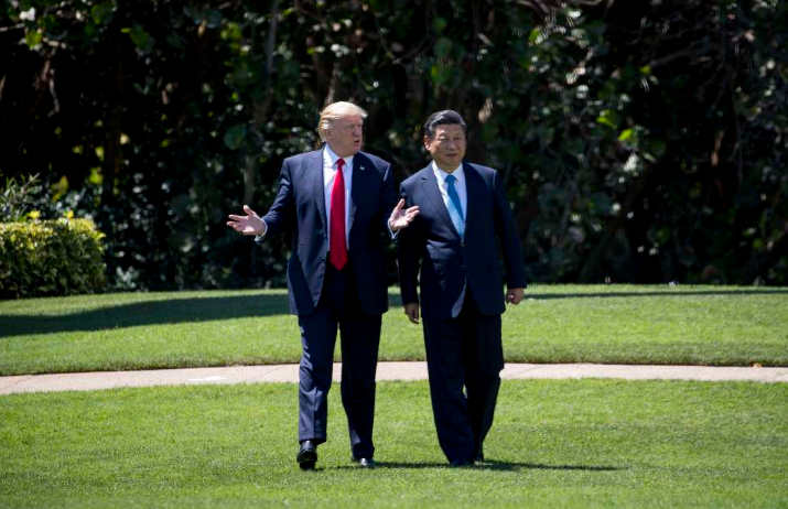President Xi Jinping of China walks with President Donald Trump at his Mar-a-Lago resort in Palm Beach, Fla. (New York Times)