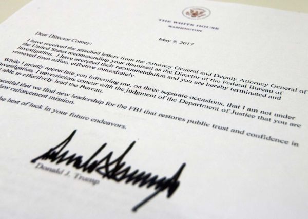 The termination letter from President Donald Trump to FBI Director James Comey is photographed in Washington, May 9, 2017. (AP Photo/Jon Elswick)