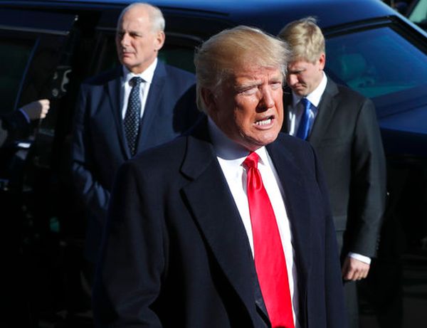 President Donald Trump makes remarks while arriving at the Pentagon on Jan. 18, 2018. Standing behind him is White House Chief of Staff John Kelly. (AP/Pablo Martinez Monsivais)