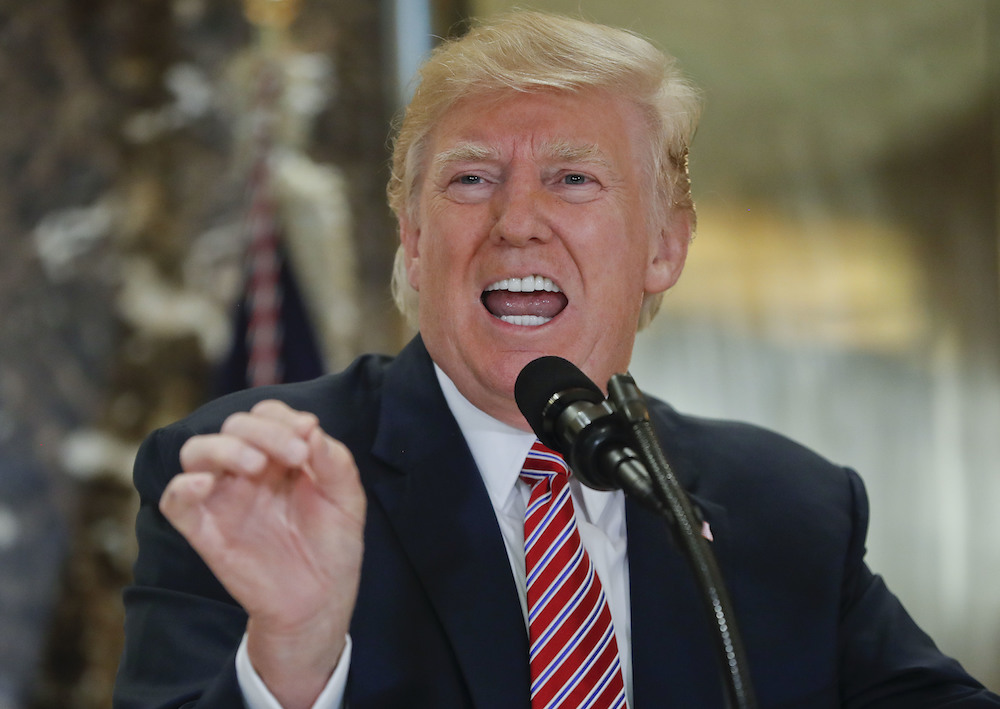 President Donald Trump speaks to the media in the lobby of Trump Tower on Aug. 15, 2017 in New York. (AP)
