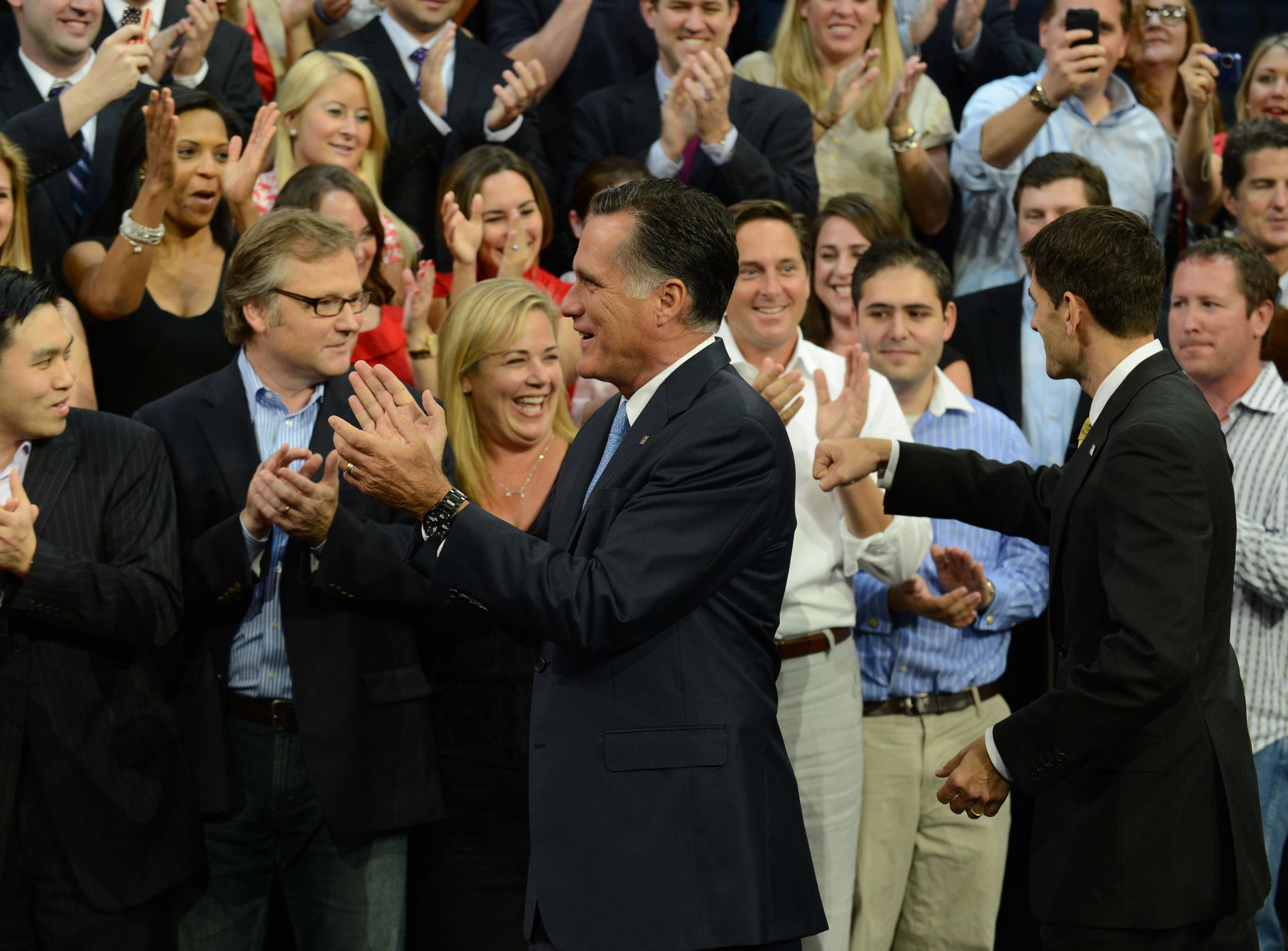 Republican Party president nominee Mitt Romney and his running mate Paul Ryan greet supporters at the party's convention in Tampa.