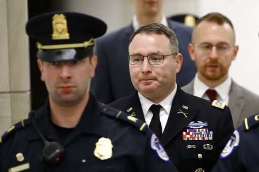 Army Lt. Col. Alexander Vindman, a military officer at the National Security Council, departs a closed door meeting after testifying as part of the House impeachment inquiry. (AP Photo/Patrick Semansky)