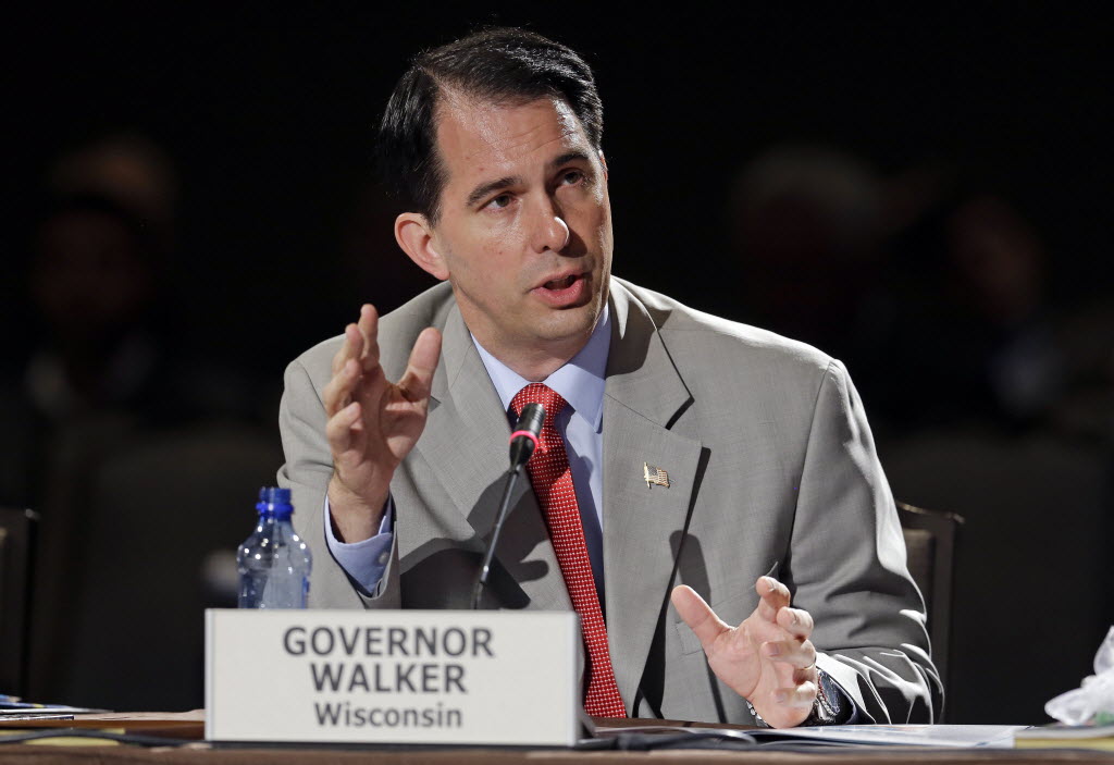 Wisconsin Gov. Scott Walker speaks during a meeting on jobs and education at the National Governors Association convention Saturday, July 12, 2014, in Nashville, Tenn.