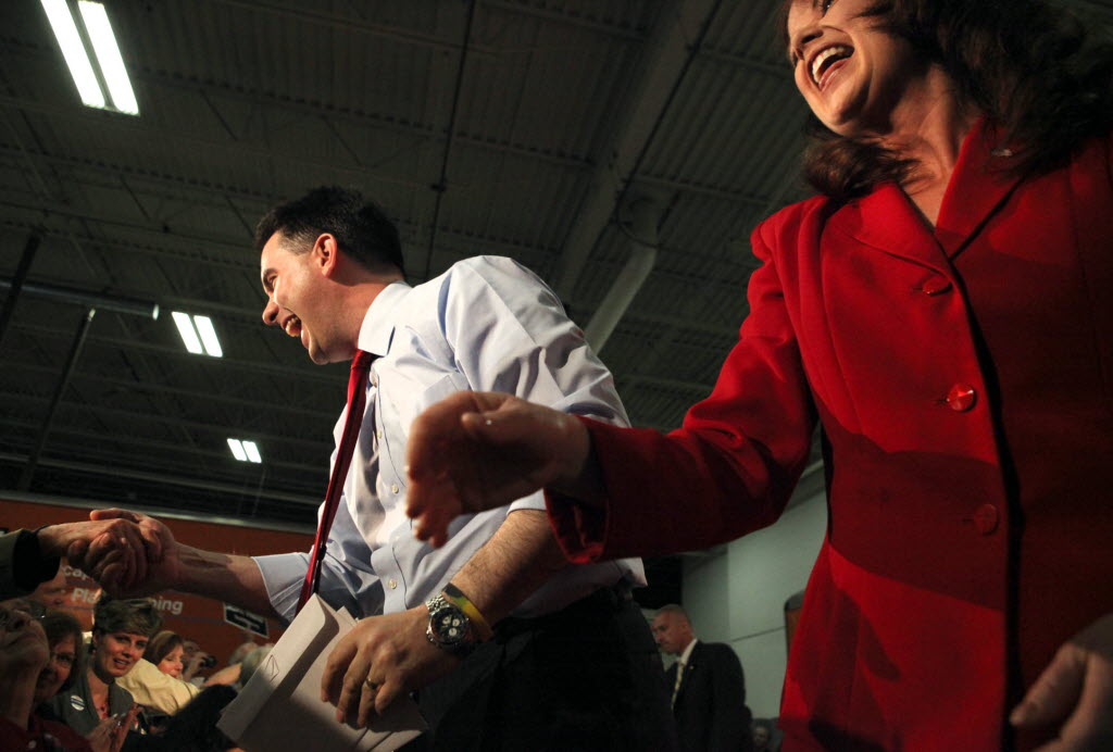 Gov. Scott Walker and Lt. Gov. Rebecca Kleefisch greet supporters at a campaign event. Both are facing recall elections June 5, 2012.