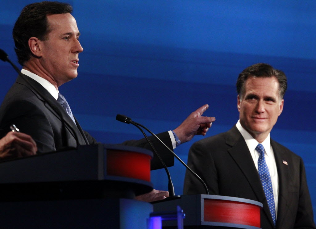 In this Associated Press photo, GOP presidential candidates Rick Santorum and Mitt Romney participate in a debate in South Carolina. They face off again April 3, 2012 in primaries in Wisconsin, Maryland and D.C.