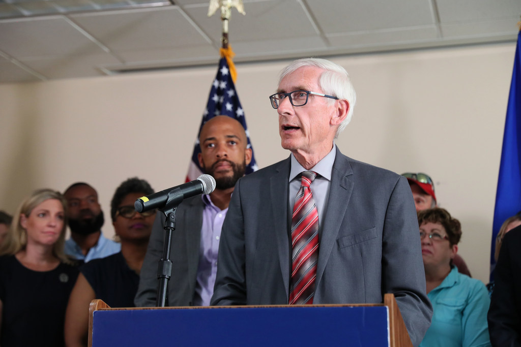 Gov. Tony Evers, center and Lt. Governor Mandela Barnes, left, spoke at a press conference on expanding Medicaid in Wisconsin on Aug. 5, 2019. Michael Sears/Milwaukee Journal Sentinel